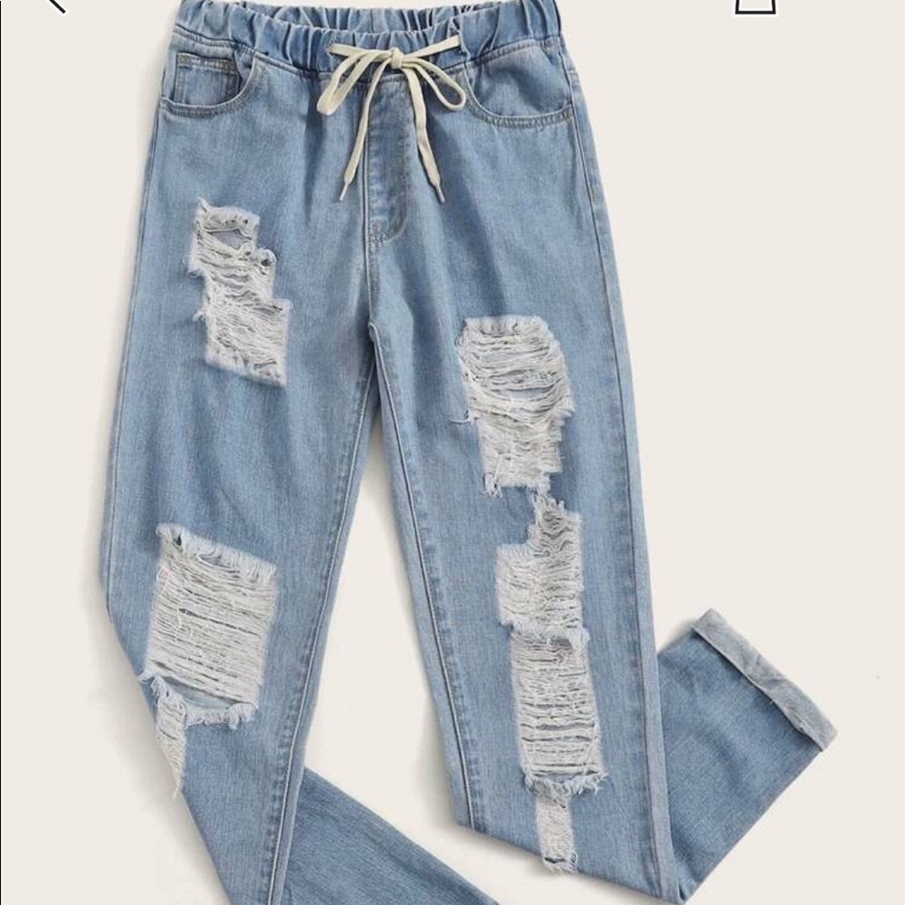 Distressed boyfriend jeans